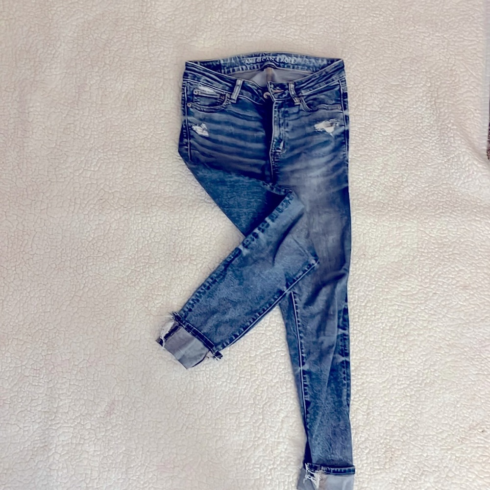 AE Next Lvl Stretch Distressed Skinnies Light Wash